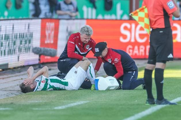 09.05.2025, Fussball, Saison 2024 2025, 2. Bundesliga, 33. Spieltag, Preussen Münster - Hertha BSC, Joshua Mees (Preußen Münster) liegt verletzt am Boden. Münster LVM Arena NRW Deutschland xRHR-FOTO TRx
