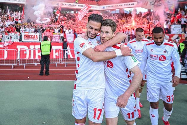 09.05.2025, Fussball, 2. Bundesliga, 33. Spieltag Saison 2024 2025, 1.FC Nürnberg - 1.FC Köln, Florian Kainz (1. FC Köln) freut sich über das Tor zum 1:2, mit Leart Paqarada (1. FC Köln) xRHR-FOTO TKx