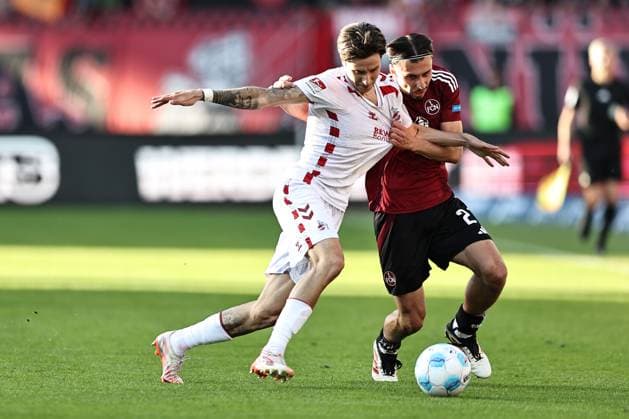 Denis Huseinbasic, FCK, und Berkay Yilmaz, FCN, im Rückrundenspiel der Saison 2024 2025 zwischen dem 1. FC Nürnberg und dem 1. FC Köln (1:2) in Nürnberg; 09 05 2025 -