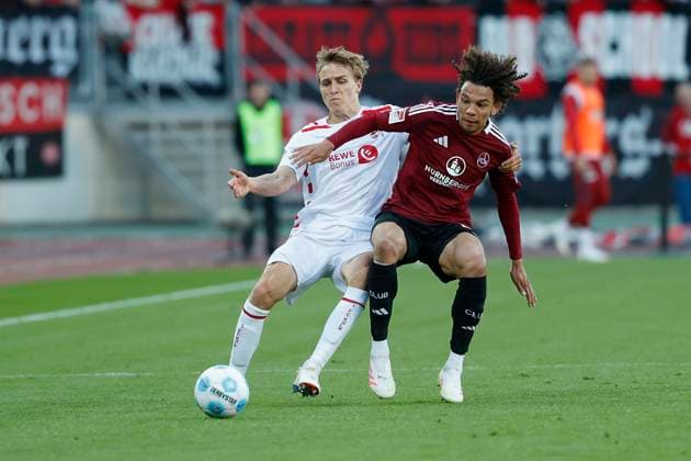 v.l. Timo Hübers (1. FC Koeln, 4) und Janis Antiste (1.FC Nuernberg, 28) 09.05.2025, Fussball, 2. Bundesliga, 1. FC Nürnberg - 1. FC Köln, GER, Nuernberg, Max-Morlock-Stadion, DFL REGULATIONS PROHIBIT ANY USE OF PHOTOGRAPHS AS IMAGE SEQUENCES AND OR QUASI-VIDEO.