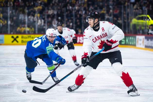 250510 Miha Bericic of Slovenia and Nathan MacKinnon of Canada during the 2025 IIHF Ice hockey, Eishockey World Championship, WM, Weltmeisterschaft group stage game between Slovenia and Canada on May 10, 2025 in Stockholm. Photo: Maxim ThorÃ BILDBYRAN kod MT MT0810 ishockey ice hockey ishockey-vm 2025 vm 2025 iihf world championship slovenia kanada canada bbeng gruppspel Copyright: MAXIMxTHORE BB250510MT023