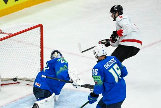 STOCKHOLM, SWEDEN 20250510 Canada s Noah Dobson ( 8, right) scores at Slovenia s goalkeeper Lukas Horak during the IIHF Ice hockey, Eishockey World Championship, WM, Weltmeisterschaft group A match between Slovenia and Canada at Avicii Arena in Stockholm, Sweden, on May 10, 2025. STOCKHOLM SWEDEN x10080x