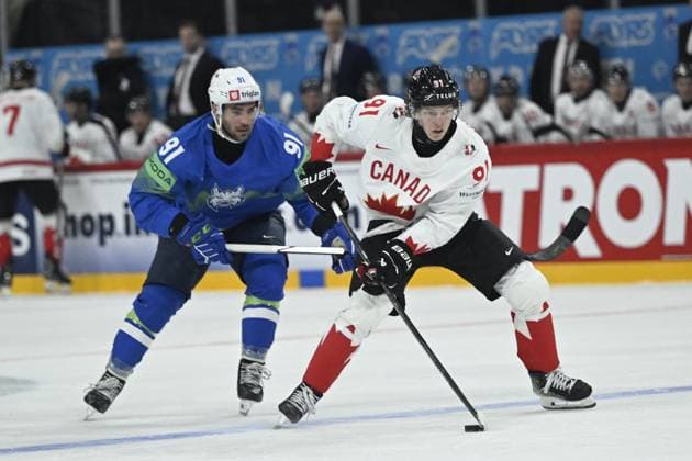 STOCKHOLM, SVERIGE 20250510 Canada s Kent Johnson and Slovenia s Zan Jezovsek during the IIHF Ice hockey, Eishockey World Championship, WM, Weltmeisterschaft group A match between Slovenia and Canada at Avicii Arena in Stockholm, Sweden, on May 10, 2025. STOCKHOLM SVERIGE x10080x