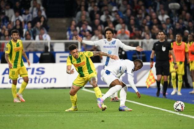 AJ Auxerre v FC Nantes - Ligue 1 MCDonald s 2024 2025 25 Hamed Junior TRAORE (aja) - 06 DOUGLAS AUGUSTO (fcn) during the Ligue 1 MCDonald s match between Auxerre and Nantes on May 10, 2025 at Stade de L Abbe-Deschamps in Auxerre, France. Auxerre France  Copyright: xFEPx 776319160