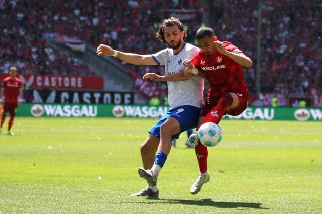 11.05.2025, xmohx, Fussball 2.Bundesliga, 1.FC Kaiserslautern - SV Darmstadt 98 v.l. Frasier Hornby (SV Darmstadt 98) Kevin Prince Redondo (1. FC Kaiserslautern) Zweikampf, Aktion, action, battle for the ball (DFL DFB REGULATIONS PROHIBIT ANY USE OF PHOTOGRAPHS as IMAGE SEQUENCES and or QUASI-VIDEO) Kaiserslautern