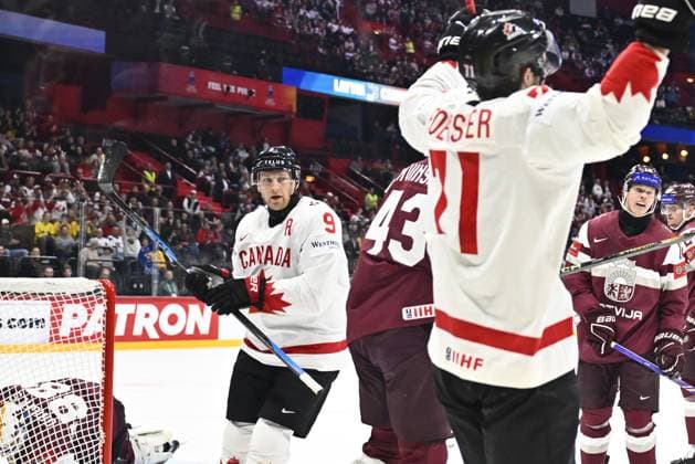 STOCKHOLM, SVERIGE 20250511 Canada s Nate MacKinnon ( 9) scores 1-2 during the IIHF Ice hockey, Eishockey World Championship, WM, Weltmeisterschaft group A match between Latvia and Canada at Avicii Arena in Stockholm, Sweden, on May 11, 2025. STOCKHOLM SVERIGE x10430x