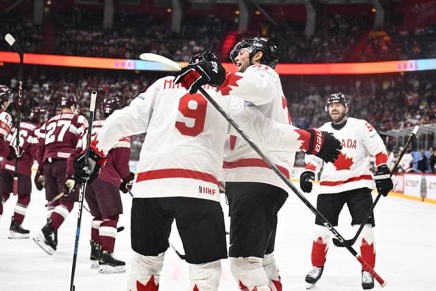 STOCKHOLM, SWEDEN 20250511 Canada s Nate MacKinnon ( 9) scores 1-2 during the IIHF Ice hockey, Eishockey World Championship, WM, Weltmeisterschaft group A match between Latvia and Canada at Avicii Arena in Stockholm, Sweden, on May 11, 2025. STOCKHOLM SWEDEN x10430x