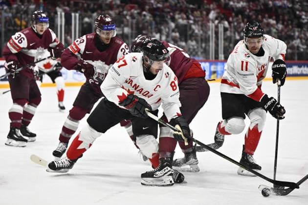 STOCKHOLM, SWEDEN 20250511 Canada s Sidney Crosby and Travis Konecny during the IIHF Ice hockey, Eishockey World Championship, WM, Weltmeisterschaft group A match between Latvia and Canada at Avicii Arena in Stockholm, Sweden, on May 11, 2025. STOCKHOLM SWEDEN x10430x