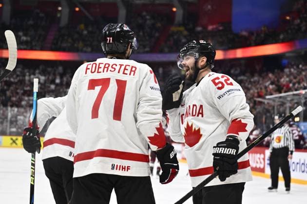 STOCKHOLM, SVERIGE 20250511 Canada s Mackenzie Weegar and Tyson Foerster celebrating 2-1 during the IIHF Ice hockey, Eishockey World Championship, WM, Weltmeisterschaft group A match between Latvia and Canada at Avicii Arena in Stockholm, Sweden, on May 11, 2025. STOCKHOLM SVERIGE x10430x