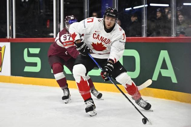 STOCKHOLM, SVERIGE 20250511 Canada s Will Cuylle and Latvia s Haralds Egle during the IIHF Ice hockey, Eishockey World Championship, WM, Weltmeisterschaft group A match between Latvia and Canada at Avicii Arena in Stockholm, Sweden, on May 11, 2025. STOCKHOLM SVERIGE x10430x