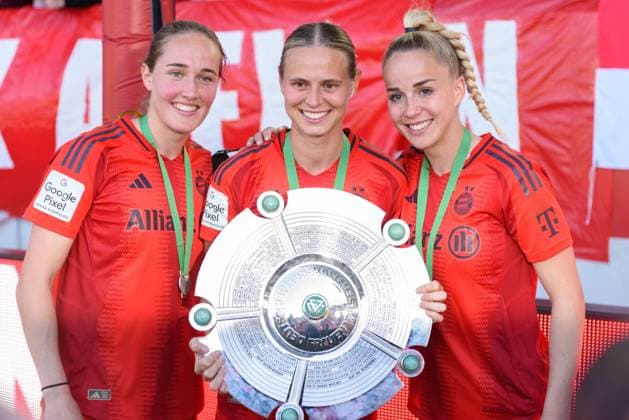 Sydney Lohmann (12 FC Bayern Munich), Klara Bühl Buehl (17 FC Bayern Munich) and Giulia Gwinn (7 FC Bayern Munich) with the Meisterschale championship trophy after the Google Pixel Frauen Bundesliga match between FC Bayern Munich and SGS Essen at FC Bayern Campus, Munich, Germany. (Sven Beyrich SPP) Copyright: xSvenxBeyrich SPPx spp-en-SvBe-20250511-D75_1339