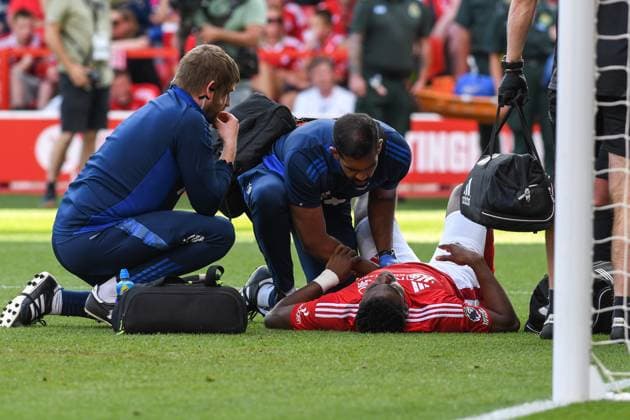 Nottingham Forest v Leicester City, English Premier League, The City Ground, Nottingham, UK - 11 May 2025 Nottingham Forests Taiwo Awoniyi receiving treatment after an injury , UK NEWSPAPERS OUT Copyright: xRichardxBowcottx