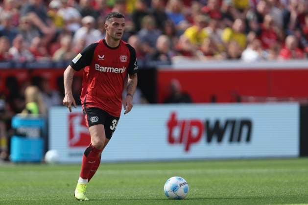 Granit Xhaka (Bayer 04 Leverkusen) in Aktion, am Ball, Einzelaktion waehrend des Spiels der 1. Bundesliga zwischen Bayer 04 Leverkusen und Borussia Dortmund, BayArena am 11. May 2025 in Leverkusen, Deutschland. (Foto von Oliver Kaelke DeFodi Images) +++ Granit Xhaka (Bayer 04 Leverkusen) controls the ball during the Bundesliga match between Bayer 04 Leverkusen and Borussia Dortmund at BayArena on May 11, 2025 in Leverkusen, Germany. (Photo by Oliver Kaelke DeFodi Images) DFL regulations prohibit any use of photographs as image sequences and or quasi-video. (Photo by Oliver Kaelke DeFodi Images)