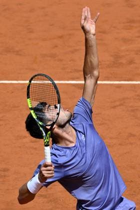 Carlos Alcaraz of Spain serves during the match against Karen Khachanov of Russia at the Internazionali BNL d Italia 2025 tennis tournament at Foro Italico in Rome, Italy on May 13, 2025. AndreaxStaccioli