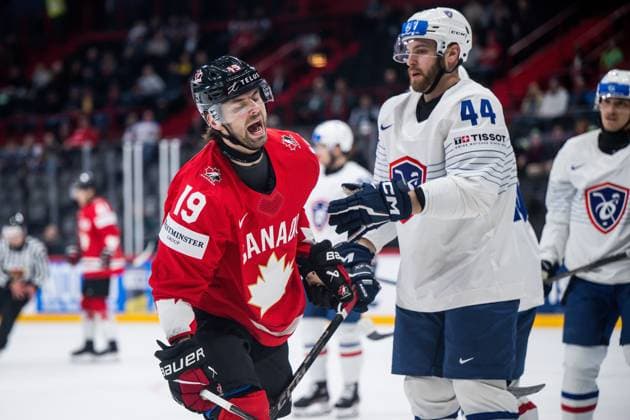 250513 Adam Fantilli of Canada and Kevin Spinozzi of France during the 2025 IIHF Ice hockey, Eishockey World Championship, WM, Weltmeisterschaft group stage game between Canada and France on May 13, 2025 in Stockholm. Photo: Maxim Thore BILDBYRAN kod MT MT0814 ishockey ice hockey ishockey-vm 2025 vm 2025 iihf world championship kanada canada frankrike france bbeng Copyright: MAXIMxTHORE BB250513MT013