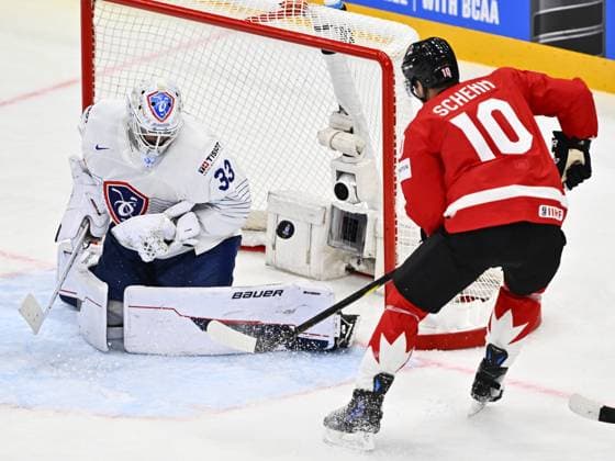 STOCKHOLM, SWEDEN 20250513 France s goalkeeper Julian Junca (L) saves a puck from Canada s Brayden Schenn during the IIHF Ice hockey, Eishockey World Championship, WM, Weltmeisterschaft group A match between CAnada and France at Avicii Arena in Stockholm, Sweden, on May 13, 2025. STOCKHOLM SWEDEN x10040x