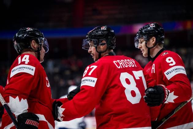 250513 Sidney Crosby of Canada celebrates with Bo Horvat and Nathan MacKinnon after he scored 3-0 during the 2025 IIHF Ice hockey, Eishockey World Championship, WM, Weltmeisterschaft group stage game between Canada and France on May 13, 2025 in Stockholm. Photo: Maxim Thore BILDBYRAN kod MT MT0814 ishockey ice hockey ishockey-vm 2025 vm 2025 iihf world championship kanada canada frankrike france bbeng bbauto jubel Copyright: MAXIMxTHORE BB250513MT035