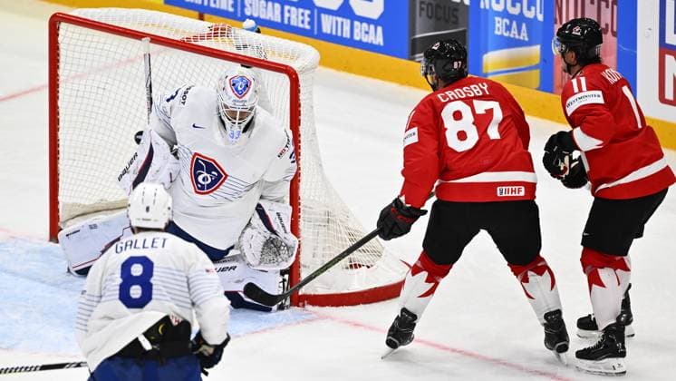 STOCKHOLM, SWEDEN 20250513 France s goalkeeper Julian Junca (L) saves a puck from Canada s Brayden Schenn during the IIHF Ice hockey, Eishockey World Championship, WM, Weltmeisterschaft group A match between CAnada and France at Avicii Arena in Stockholm, Sweden, on May 13, 2025. STOCKHOLM SWEDEN x10040x
