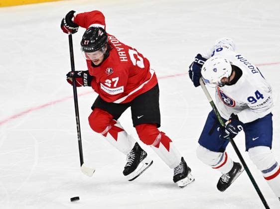 STOCKHOLM, SWEDEN 20250513 Canada s Barrett Hayton and France s Tim Bozon during the IIHF Ice hockey, Eishockey World Championship, WM, Weltmeisterschaft group A match between CAnada and France at Avicii Arena in Stockholm, Sweden, on May 13, 2025. STOCKHOLM SWEDEN x10040x