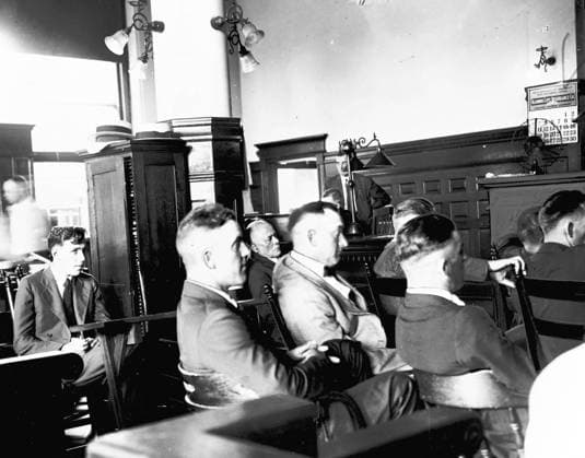 1921 - Chicago, Illinois, USA - EDDIE CICOTTE, second from left, Shoeless JOE JACKSON and CLAUDE Lefty WILLIAMS at their 1921 trial. Eight White Sox players were charged with conspiracy to commit fraud for taking money to throw baseball games during the 1919 World Series. The eight players, known as the "Black Sox," were acquitted, but they were banned from playing professional baseball. Chicago USA - ZUMAm67_ 19210701_spt_m67_178 Copyright: xChicagoxTribune-TNSx