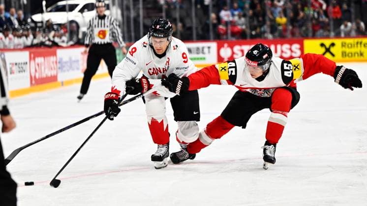 Canada s Nate MacKinnon and Austria s Gregor Biber during the IIHF Ice hockey, Eishockey World Championship, WM, Weltmeisterschaft group A match between Canada and Austria at Avicii Arena in Stockholm, Sweden, on May 15, 2025. STOCKHOLM SWEDEN x10040x