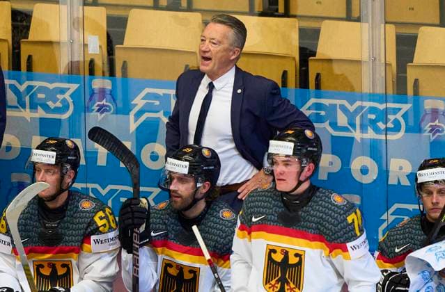 Harold Kreis DEB National coach of Germany, headcoach, team manager, Bundestrainer, Manuel Wiederer Nr.56 of Germany Wojciech Stachowiak 19 of Germany Justin Schütz Nr.74 of Germany in the preliminary round match SWITZERLAND - GERMANY 5-1 of the IIHF Ice hockey, Eishockey World Championship, WM, Weltmeisterschaft Group B in Jyske Bank Arena in Herning, Denmark, May 15, 2025. Season 2024 2025