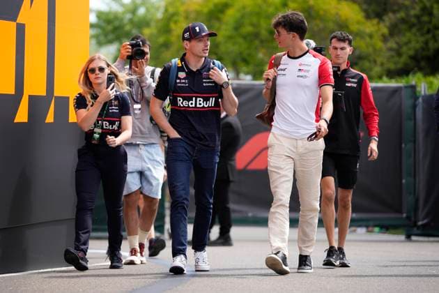 May 16, 2025, Imola, Italia: Max Verstappen of Netherlands and Oracle Red Bull Racing (L) Oliver Bearman of United Kingdom and MoneyGram Haas F1 Team (R) arrive at circuit with during free practice 1 of the Formula 1 GP Of Made in Italy and Emilia Romagna at Enzo e Dino Ferrari Circuit on May 14 2025 in Imola, Italy..ANSA DANILO DI GIOVANNI. Formula 1 GP Of Made In Italy And Emilia Romagna - Free Practice 1  - ZUMAa110 20250516_zaf_a110_006 Copyright: xDaniloxDixGiovannix