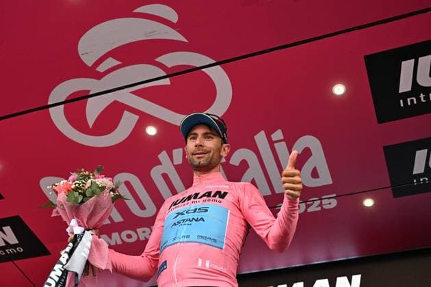 May 17, 2025, Castelraimondo, ITALY: Italian rider Diego Ulissi of Xds Astana Team wearing the overall leader s pink jersey, poses on the podium after the 8th stage of the 108 Giro d Italia 2025, cycling race over 197 km from Giulianova to Castelraimondo, Italy, 17 May 2025. ANSA LUCA ZENNARO. Giro D Italia Cycling Tour - Stage 8  - ZUMAa110 20250517_zaf_a110_088 Copyright: xLucaxZennarox