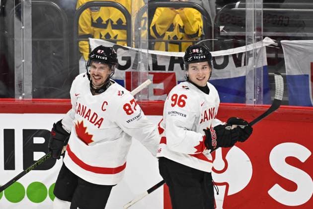 STOCKHOLM, SWEDEN 20250517 Canada s Sidney Crosby scores 3-0 and celebrates with Canada s Macklin Celebrini during the IIHF Ice hockey, Eishockey World Championship, WM, Weltmeisterschaft group A match between Canada and Slovakia at Avicii Arena in Stockholm, Sweden, on May 17, 2025. STOCKHOLM SWEDEN x10040x