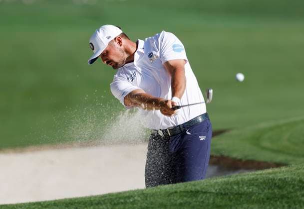 Bryson DeCambeau.hits out of a bunker on the 18th hole during the third round of the 2025 PGA, Golf Herren Championship at the Quail Hollow Golf Club in Charlotte, North Carolina on Saturday, May 17, 2025.  CHA20250517661 TANNENxMAURY