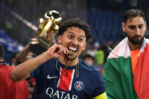 PSG celebrates 2024-2025 Ligue 1 trophy - FA Paris Saint-Germain’s defender Marquinhos celebrates during the 2024-2025 Ligue 1 trophy ceremony following the French L1 football match between Paris Saint-Germain and AJ Auxerre at the Parc des Princes stadium in Paris on May 17, 2025. Photo by Firas Abdullah ABACAPRESS.COM Paris Île-de-France France  Copyright: xAbdullahxFiras ABACAx