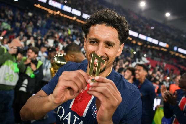 PSG celebrates 2024-2025 Ligue 1 trophy - FA Paris Saint-Germain’s defender Marquinhos celebrates during the 2024-2025 Ligue 1 trophy ceremony following the French L1 football match between Paris Saint-Germain and AJ Auxerre at the Parc des Princes stadium in Paris on May 17, 2025. Photo by Firas Abdullah ABACAPRESS.COM Paris Île-de-France France  Copyright: xAbdullahxFiras ABACAx