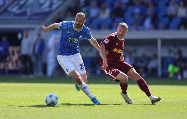 18.05.2025, xdcx, Fussball 2. Bundesliga, SV Darmstadt 98 - SSV Jahn Regensburg, emonline, emspor, despor, v.l., Aleksandar Vukotic (SV Darmstadt 98), Erik Hottmann (SSV Jahn Regensburg) DFL DFB REGULATIONS PROHIBIT ANY USE OF PHOTOGRAPHS AS IMAGE SEQUENCES AND OR QUASI-VIDEO.