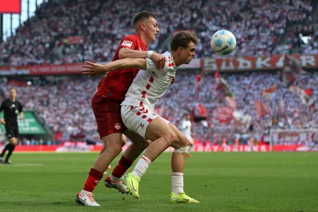 Filip Kaloc (1.FC Kaiserslautern) und Joel Schmied (1. FC Koeln) im Zweikampf waehrend des Spiels der 2. Bundesliga zwischen 1. FC Köln und 1. FC Kaiserslautern im RheinEnergieStadion am 18. May 2025 in Köln, Deutschland. (Foto von Oliver Kaelke DeFodi Images) +++ Filip Kaloc (1.FC Kaiserslautern) und Joel Schmied (1. FC Koeln) battle for the ball during the 2. Bundesliga match between 1. FC Köln and 1. FC Kaiserslautern at RheinEnergieStadion on May 18, 2025 in Cologne, Germany. (Photo by Oliver Kaelke DeFodi Images) DFB DFL REGULATIONS PROHIBIT ANY USE OF PHOTOGRAPHS AS IMAGE SEQUENCES AND OR QUASI-VIDEO. (Photo by Oliver Kaelke DeFodi Images)