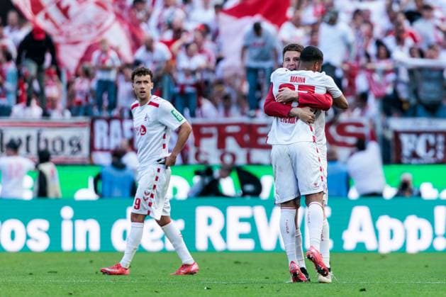 2.? ?Fußball Bundesliga, 1. FC Köln - 1. FC Kaiserslautern, 18.05.2025 Jubel zum 3:0 durch Florian Kainz (1. FC Köln, 11) Dominique Heintz (1. FC Köln, 3) und Linton Maina (1. FC Köln, 37) umarmen sich 2. Fußball Bundesliga, 1. FC Köln - 1. FC Kaiserslautern, Köln, RheinEnergiestadion am 18.05.2025 DFL REGULATIONS PROHIBIT ANY USE OF PHOTOGRAPHS AS IMAGE SEQUENCES AND OR QUASI-VIDEO.