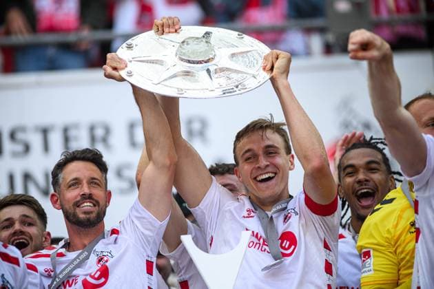 COLOGNE, GERMANY - 18 MAY, 2025: Mark Uth, Timo Huebers, captain - The final match of 2.Bundesliga 1.FC Koeln vs 1. FC Kaiserslautern at Rhein Energie Stadion.  Copyright: xVITALIIxKLIUIEVx