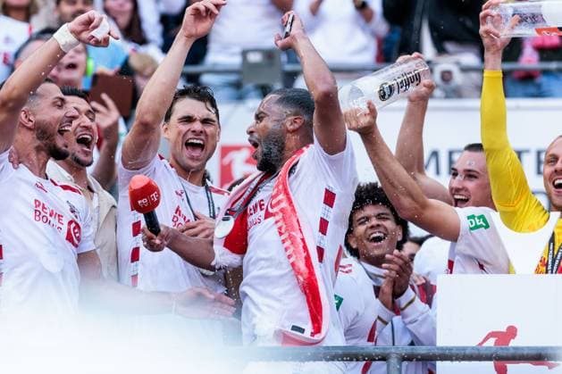2.? ?Fußball Bundesliga, 1. FC Köln - 1. FC Kaiserslautern, 18.05.2025 Deutscher Meister der 2. Fussball Bundesliga - 1. FC Köln Linton Maina (1. FC Köln, 37) jubelnd nach Bierdusche 2. Fußball Bundesliga, 1. FC Köln - 1. FC Kaiserslautern, Köln, RheinEnergiestadion am 18.05.2025 DFL REGULATIONS PROHIBIT ANY USE OF PHOTOGRAPHS AS IMAGE SEQUENCES AND OR QUASI-VIDEO.