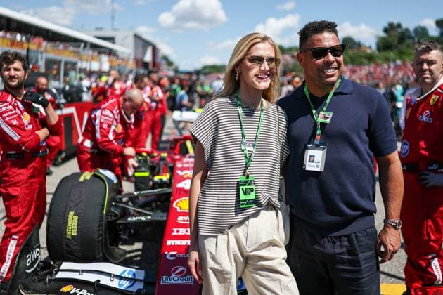(250519) -- IMOLA, May 19, 2025 -- Brazilian former football player Ronaldo poses with his wife before the Formula One Emilia Romagna Grand Prix at the Autodromo Internazionale Enzo e Dino Ferrari race track in Imola, Italy, May 18, 2025. (Photo by Xinhua) (SP)ITALY-IMOLA-AUTO-F1 GRAND PRIX QianxJun 