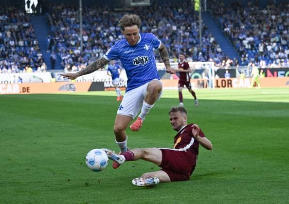 18.05.2025, xsltx, Fussball 2.Bundesliga, SV Darmstadt 98 - Jahn Regensburg v.l. Luca Marseiler (SV Darmstadt 98), Tim Handwerker (SSV Jahn Regensburg) (DFL DFB REGULATIONS PROHIBIT ANY USE OF PHOTOGRAPHS as IMAGE SEQUENCES and or QUASI-VIDEO)