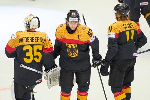 Team DEB sad Mathias Niederberger Nr. 35 goalie of Germany Moritz Seider 53 of Germany Korbinian Geibel 11 of Germany in the preliminary round match GERMANY - CZECHIA 0-6 of the IIHF Ice hockey, Eishockey World Championship, WM, Weltmeisterschaft Group B in Jyske Bank Boxen Arena in Herning, Denmark, May 17, 2025. Season 2024 2025