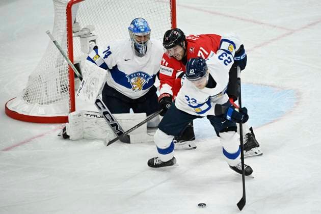 STOCKHOLM, SWEDEN 20250519 Canada s Tyson Foerster against Finland s Nikolas Matinpalo and Finland s Juuse Saros during the IIHF Ice hockey, Eishockey World Championship, WM, Weltmeisterschaft group A match between Canada and Finland at Avicii Arena in Stockholm, Sweden, on May 19, 2025. STOCKHOLM SWEDEN x10080x