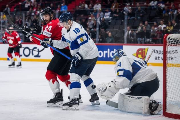 250519 Phillip Danault of Canada against Vili Saarijärvi and goaltender Juuse Saros of Finland during the 2025 IIHF Ice hockey, Eishockey World Championship, WM, Weltmeisterschaft group stage game between Canada and Finland on May 19, 2025 in Stockholm. Photo: Simon Hastegard BILDBYRAN kod SH SH0623 ishockey ice hockey ishockey-vm 2025 vm 2025 iihf world championship kanada canada finland 10 bbeng Copyright: SIMONxHASTEGARD BB250519SH009