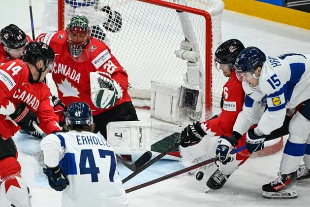 STOCKHOLM, SVERIGE 20250519 Canada s goalkeeper Marc-Andre Fleury in action against Finland s Lenni Hameenaho ( 15) and Eemil Erholtz ( 47) during the IIHF Ice hockey, Eishockey World Championship, WM, Weltmeisterschaft group A match between Canada and Finland at Avicii Arena in Stockholm, Sweden, on May 19, 2025. STOCKHOLM SWEDEN x10080x