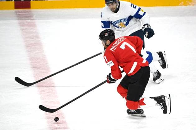 STOCKHOLM, SWEDEN 20250519 Canada s Mike Matheson and Finland s Ahti Oksanen during the IIHF Ice hockey, Eishockey World Championship, WM, Weltmeisterschaft group A match between Canada and Finland at Avicii Arena in Stockholm, Sweden, on May 19, 2025. STOCKHOLM SWEDEN x10080x