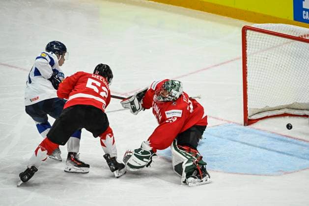 STOCKHOLM, SWEDEN 20250519 Finland s Patrik Puistola (L) scores (1-1) at Canada s goalkeeper Marc-Andre Fleury past Canada s Mackenzie Weegar during the IIHF Ice hockey, Eishockey World Championship, WM, Weltmeisterschaft group A match between Canada and Finland at Avicii Arena in Stockholm, Sweden, on May 19, 2025. STOCKHOLM SWEDEN x10080x