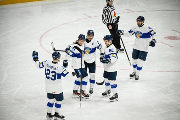 STOCKHOLM, SWEDEN 20250519 Finland s Patrik Puistola ( 21) celebrates scoring with teammates during the IIHF Ice hockey, Eishockey World Championship, WM, Weltmeisterschaft group A match between Canada and Finland at Avicii Arena in Stockholm, Sweden, on May 19, 2025. STOCKHOLM SWEDEN x10080x