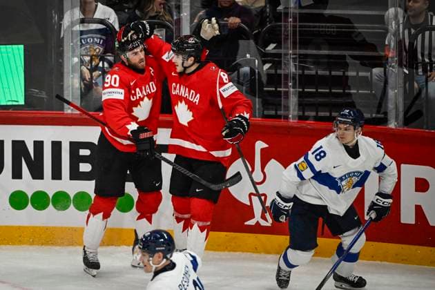 STOCKHOLM, SVERIGE 20250519 Canada s Ryan O Reilly ( 90) celebrates scoring the opening goal with teammate Noah Dobson during the IIHF Ice hockey, Eishockey World Championship, WM, Weltmeisterschaft group A match between Canada and Finland at Avicii Arena in Stockholm, Sweden, on May 19, 2025. STOCKHOLM SVERIGE x10080x