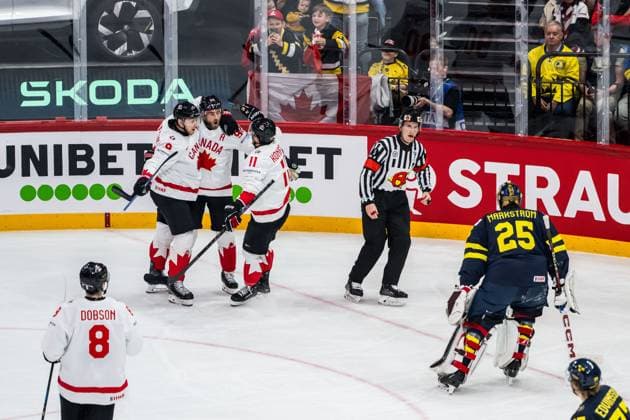 250520 Nathan MacKinnon, Ryan O Reilly and Travis Konecny of Canada celebrate and goaltender Jacob Markström of Sweden reacts after 1-3 during the 2025 IIHF Ice hockey, Eishockey World Championship, WM, Weltmeisterschaft group stage game between Sweden and Canada on May 20, 2025 in Stockholm. Photo: Simon Hastegard BILDBYRAN kod SH JM0689 ishockey ice hockey ishockey-vm 2025 vm 2025 iihf world championship sverige sweden kanada canada bbeng gruppspel jubel Copyright: SIMONxHASTEGARD BB250520SH010