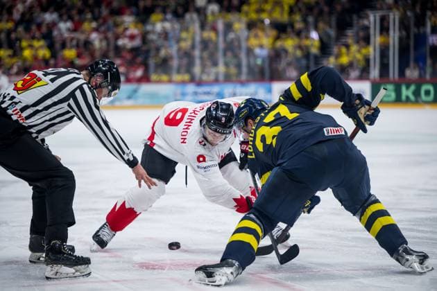 250520 Nathan MacKinnon of Canada and Isac Lundeström of Sweden during the 2025 IIHF Ice hockey, Eishockey World Championship, WM, Weltmeisterschaft group stage game between Sweden and Canada on May 20, 2025 in Stockholm. Photo: Maxim Thore BILDBYRAN kod MT JM0689 ishockey, ice hockey,ishockey-vm 2025, vm, 2025 iihf world champ Copyright: MAXIMxTHORE BB250520MT085
