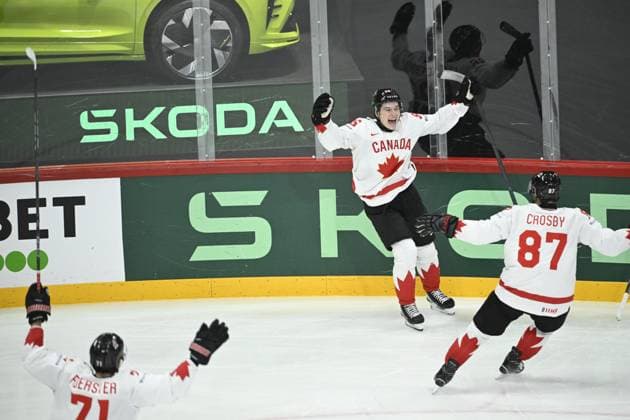 STOCKHOLM, SWEDEN 20250520 Canada s Macklin Celebrini ( 96, C) celebrates with teammates after scoring during the IIHF Ice hockey, Eishockey World Championship, WM, Weltmeisterschaft group A match between Sweden and Canada at Avicii Arena in Stockholm, Sweden, on May 20, 2025. STOCKHOLM SWEDEN x10080x